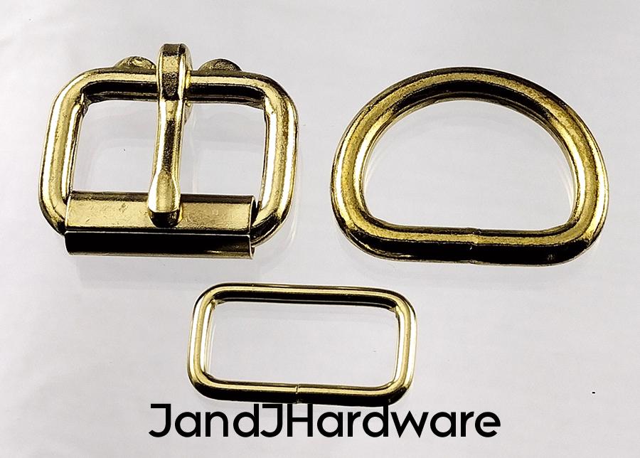 1 inch brass plated maker pack consisting of 2 each of a heel bar roller buckle, D ring, and belt keeper.
