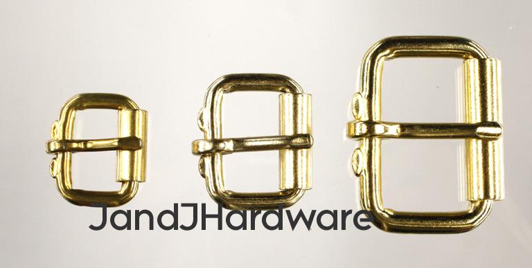 An image of a group of 3 brass plated heel bar roller buckles.